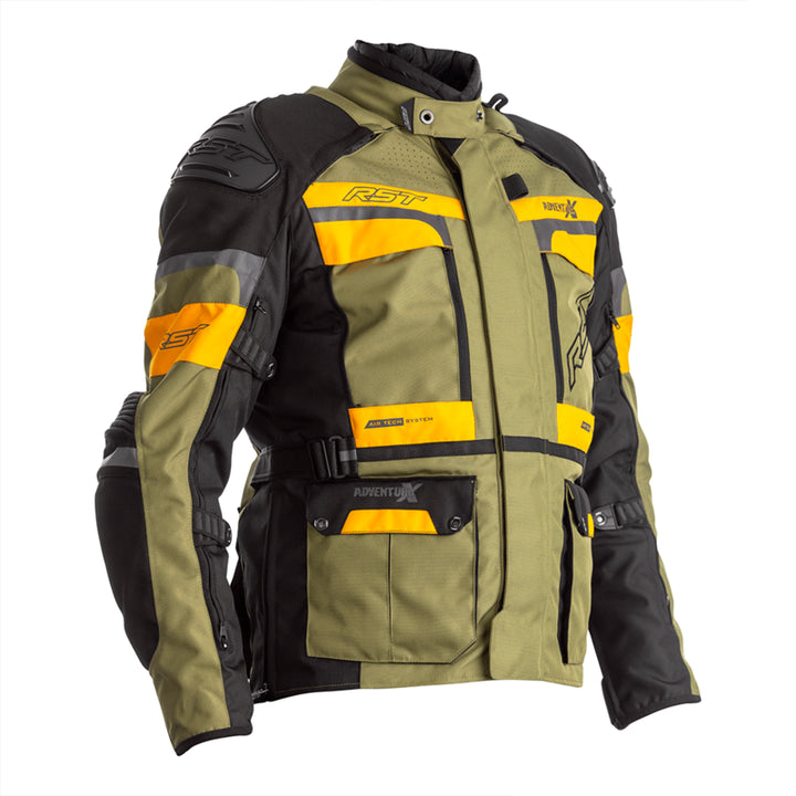 RST Textil Mc-Jacka Adventure-X Khaki med gul och svart design, justerbara remmar och flera fickor för praktisk användning.