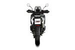 Bakre vy av motorcykel utrustad med MIVV Dakar Slip-On Muffler HU.002.LEKX, optimerad för prestanda inom reservdelar och tillbehörskategorin.