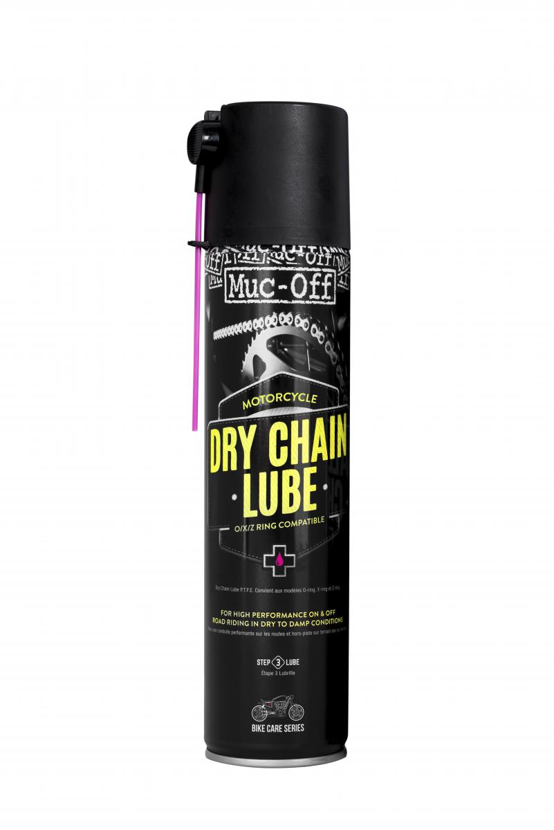 Muc-Off Kedjespray Motorcycle Dry Chain lube 400ml med svart burkdesign och rosa applikatorrör för motorcykelkedjor.